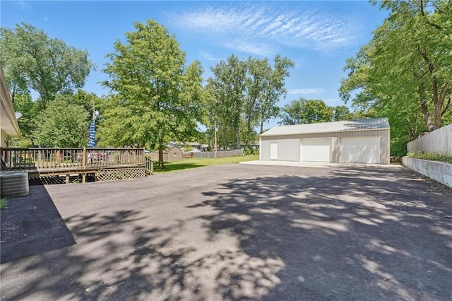 detached garage with central AC and fence