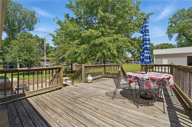 deck featuring outdoor dining space
