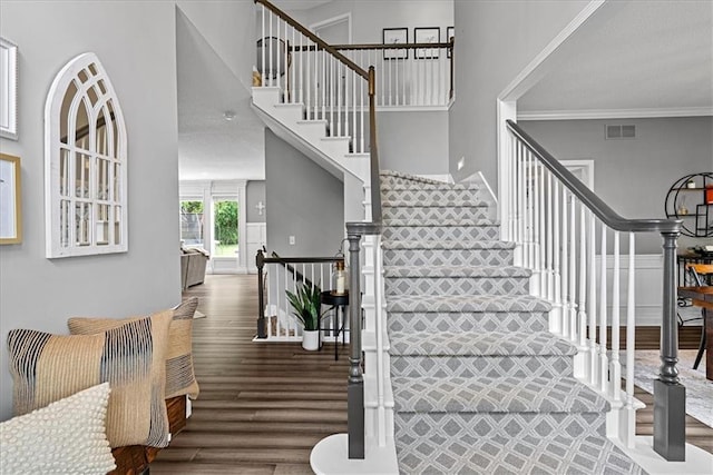 19600 W 98th St, Lenexa, KS 66220 - stairs with wood finished floors and ornamental molding