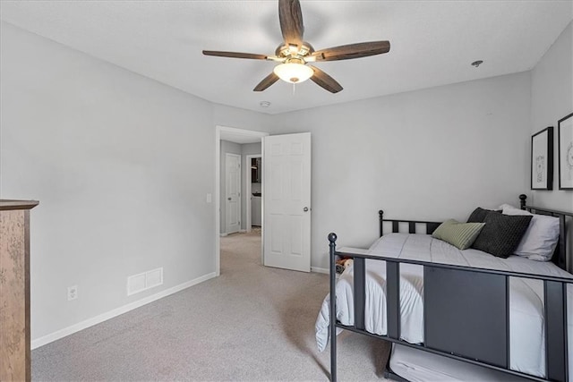 19600 W 98th St, Lenexa, KS 66220 - carpeted bedroom featuring baseboards and ceiling fan