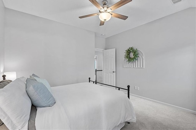 19600 W 98th St, Lenexa, KS 66220 - carpeted bedroom featuring a ceiling fan and baseboards