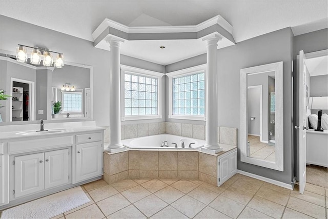 19600 W 98th St, Lenexa, KS 66220 - full bath with ornate columns, a garden tub, vanity, and tile patterned floors