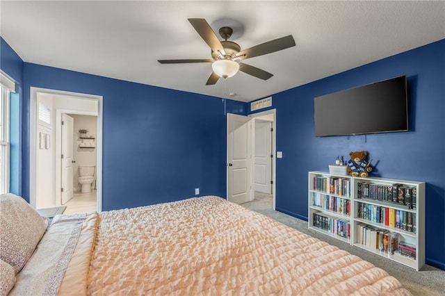 bedroom with carpet floors, a ceiling fan, and baseboards