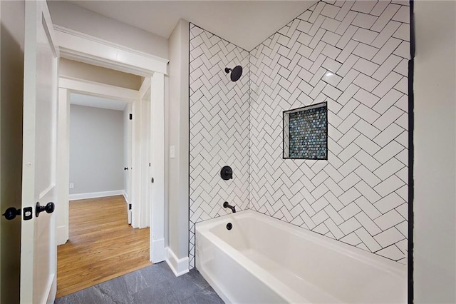 bathroom with shower / bathtub combination