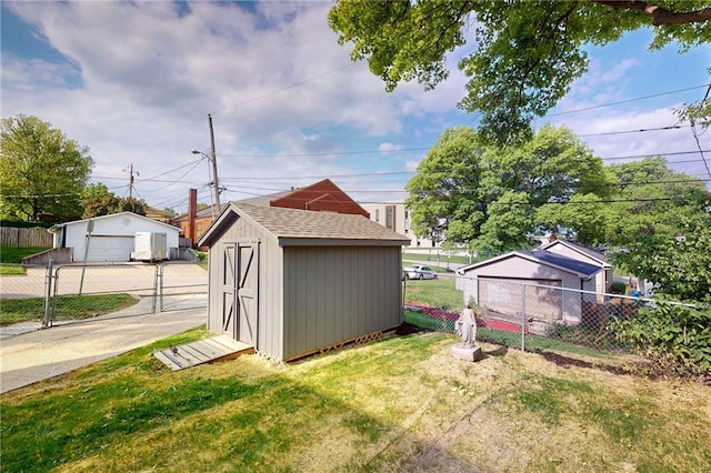 view of outbuilding with an outbuilding and a gate