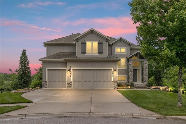 17817 Grandview St, Overland Park, KS 66013 - traditional home with stone siding, stucco siding, a yard, and driveway