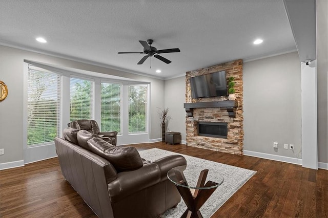 17817 Grandview St, Overland Park, KS 66013 - living area featuring ceiling fan, crown molding, baseboards, wood finished floors, and a fireplace