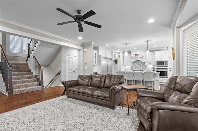 17817 Grandview St, Overland Park, KS 66013 - living room featuring a ceiling fan, stairway, ornamental molding, recessed lighting, and baseboards