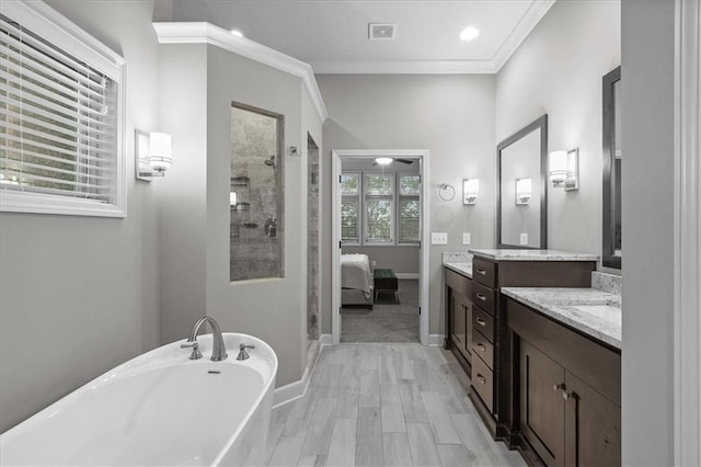 17817 Grandview St, Overland Park, KS 66013 - bathroom with a shower stall, a soaking tub, vanity, crown molding, and baseboards