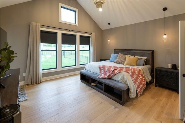 17328 Richards St, Overland Park, KS 66221 - bedroom with high vaulted ceiling, light wood finished floors, and baseboards