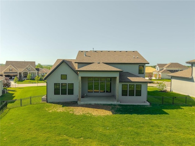 17328 Richards St, Overland Park, KS 66221 - rear view of property with a patio, roof with shingles, and a residential view