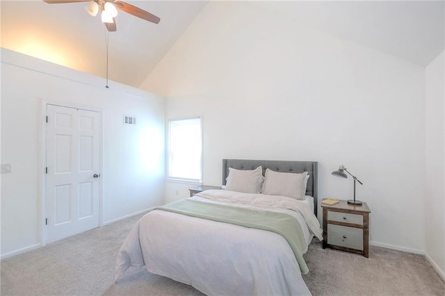carpeted bedroom featuring high vaulted ceiling, baseboards, and a ceiling fan