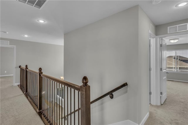 16967 S Laurelwood St, Olathe, KS 66062 - corridor with an upstairs landing, carpet flooring, baseboards, and recessed lighting