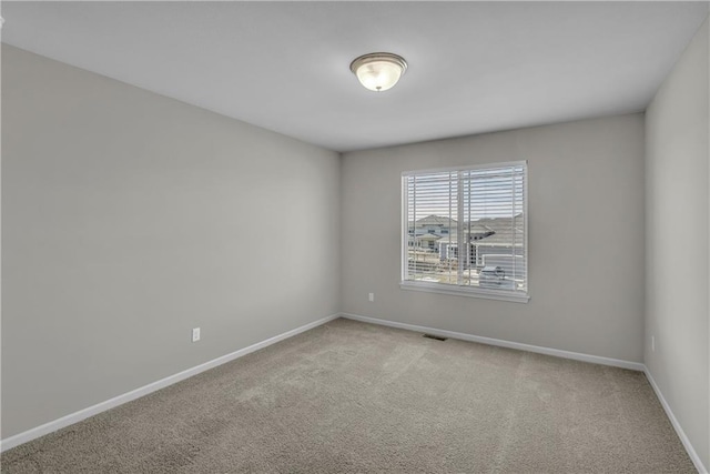 16967 S Laurelwood St, Olathe, KS 66062 - carpeted empty room featuring baseboards