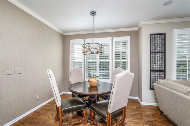 16141 Linden St, Stilwell, KS 66085 - dining room with a chandelier, wood finished floors, plenty of natural light, and crown molding