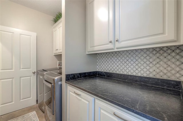 16141 Linden St, Stilwell, KS 66085 - washroom with washing machine and clothes dryer and cabinet space
