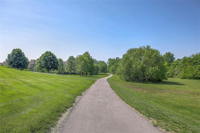 16141 Linden St, Stilwell, KS 66085 - view of community featuring a yard