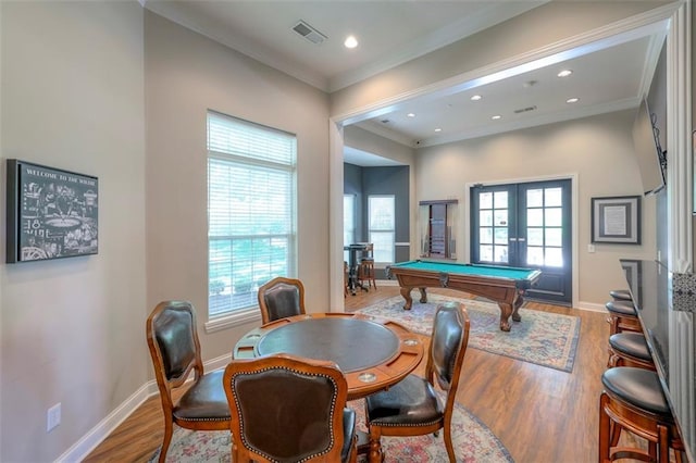 16141 Linden St, Stilwell, KS 66085 - rec room featuring french doors, pool table, plenty of natural light, wood finished floors, and ornamental molding