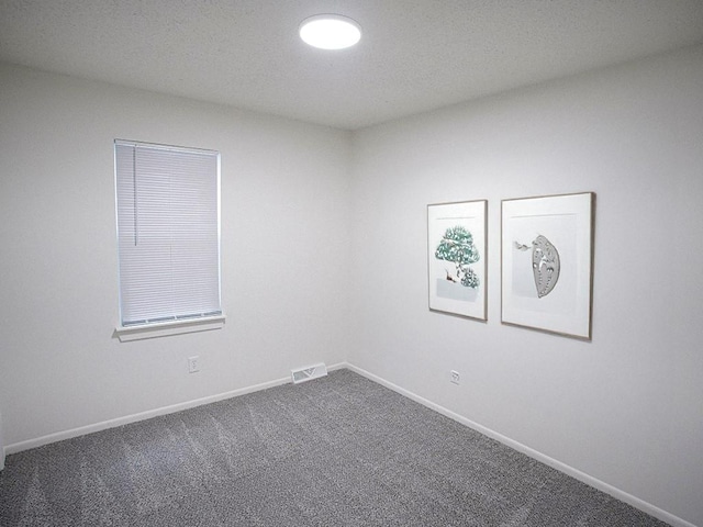 10921 Mckinley Dr, Kansas City, MO 64134 - carpeted spare room featuring baseboards