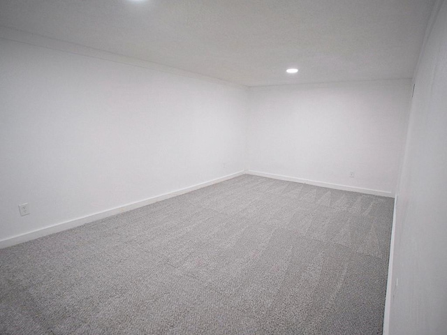 10921 Mckinley Dr, Kansas City, MO 64134 - spare room with recessed lighting, carpet, and baseboards