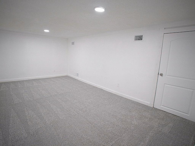 10921 Mckinley Dr, Kansas City, MO 64134 - carpeted empty room with recessed lighting and baseboards