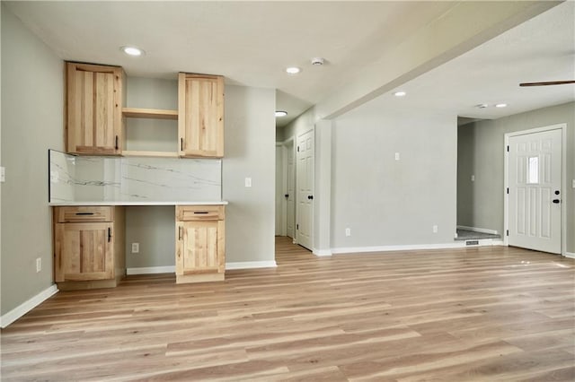 10514 E 35th St S, Independence, MO 64052 - kitchen featuring light brown cabinets, light wood-style floors, open shelves, recessed lighting, and baseboards