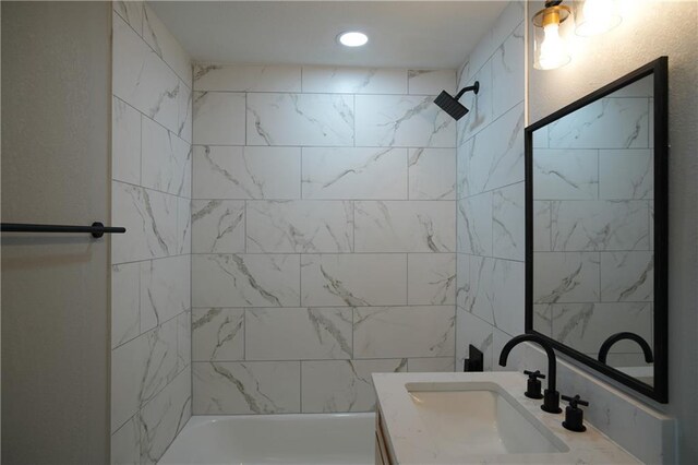 10514 E 35th St S, Independence, MO 64052 - full bathroom with vanity, bathtub / shower combination, and recessed lighting