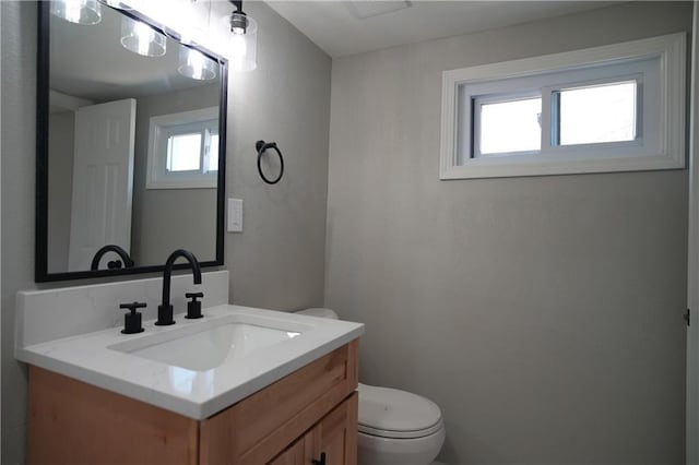 10514 E 35th St S, Independence, MO 64052 - bathroom featuring toilet and vanity