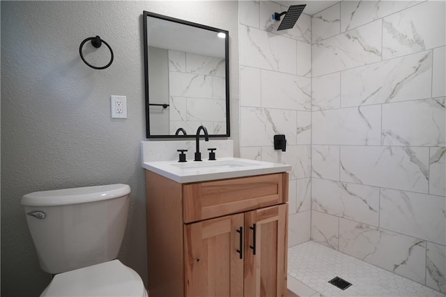 10514 E 35th St S, Independence, MO 64052 - full bathroom with tiled shower, vanity, and toilet