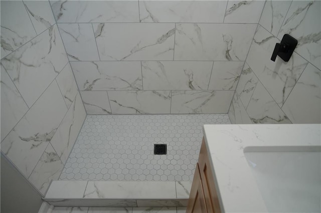 10514 E 35th St S, Independence, MO 64052 - bathroom featuring a tile shower and vanity