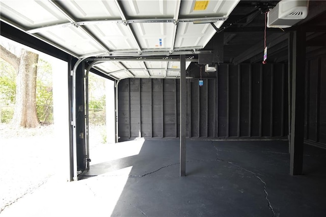 10514 E 35th St S, Independence, MO 64052 - garage featuring a garage door opener