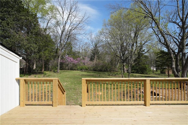 10514 E 35th St S, Independence, MO 64052 - wooden deck with a lawn and view of wooded area