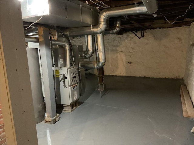 3624 Mersington Ave, Kansas City, MO 64128 - unfinished below grade area featuring heating unit