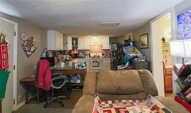 817 S Hardy Ave, Independence, MO 64053 - living area featuring light carpet and a textured ceiling