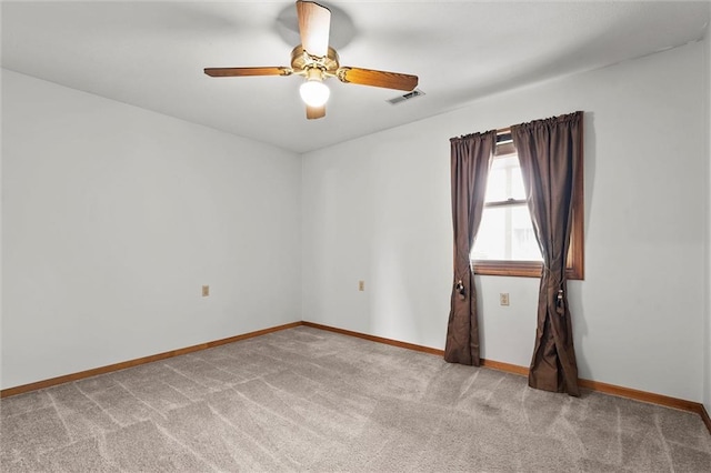 721 Cupid Ct, Raymore, MO 64083 - carpeted spare room with baseboards and ceiling fan
