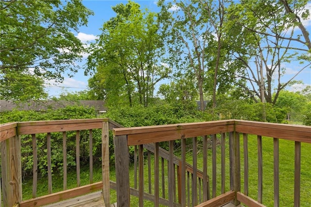 wooden terrace with a yard