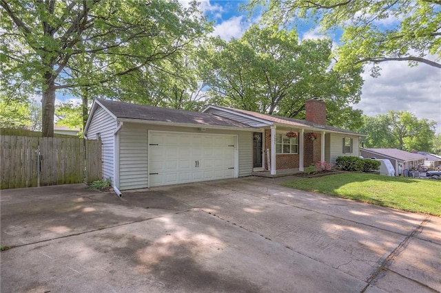 5805 N Belton Ave, Kansas City, MO 64151 - single story home featuring a chimney, a garage, driveway, and covered porch