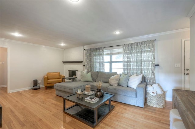 5805 N Belton Ave, Kansas City, MO 64151 - living room with crown molding, baseboards, light wood-style floors, a fireplace, and recessed lighting