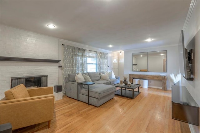 5805 N Belton Ave, Kansas City, MO 64151 - living room with crown molding, a fireplace, light wood-type flooring, and recessed lighting
