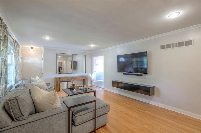 5805 N Belton Ave, Kansas City, MO 64151 - living area with ornamental molding, wood finished floors, baseboards, and recessed lighting