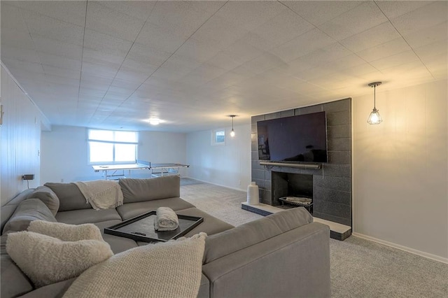 5805 N Belton Ave, Kansas City, MO 64151 - living room featuring carpet flooring, a large fireplace, and baseboards