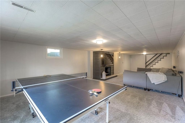 5805 N Belton Ave, Kansas City, MO 64151 - game room featuring a large fireplace and carpet