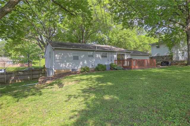 5805 N Belton Ave, Kansas City, MO 64151 - back of house with a wooden deck