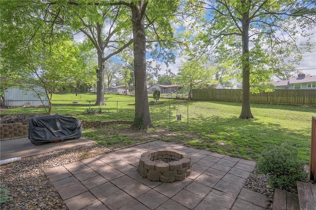 5805 N Belton Ave, Kansas City, MO 64151 - view of patio with an outdoor fire pit