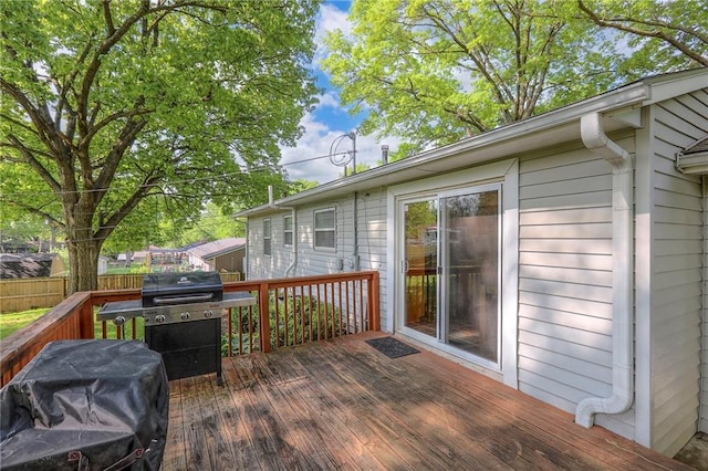 5805 N Belton Ave, Kansas City, MO 64151 - wooden terrace with fence and a grill