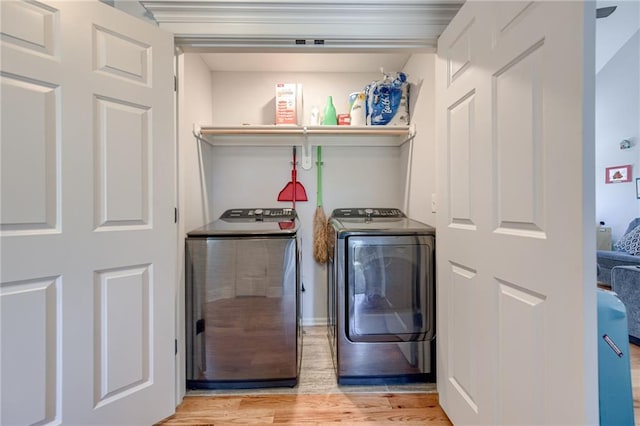 21200 W 47th Ter, Shawnee, KS 66218 - laundry room with washing machine and dryer and light wood-style floors