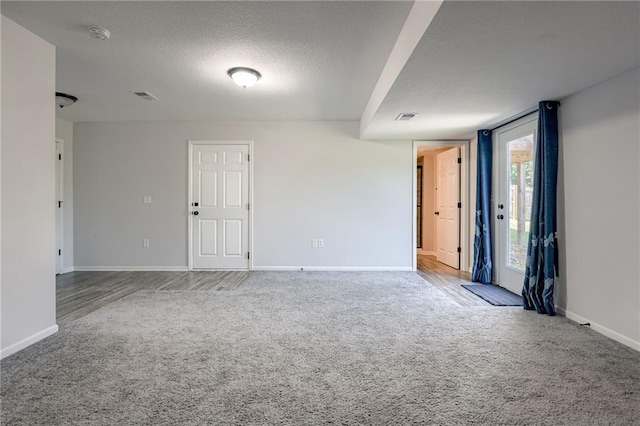 21200 W 47th Ter, Shawnee, KS 66218 - unfurnished room featuring carpet floors, baseboards, and a textured ceiling
