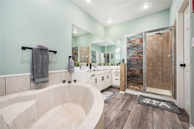 18213 Cliff Dr, Independence, MO 64055 - full bath featuring a shower stall, a bath, vanity, and recessed lighting