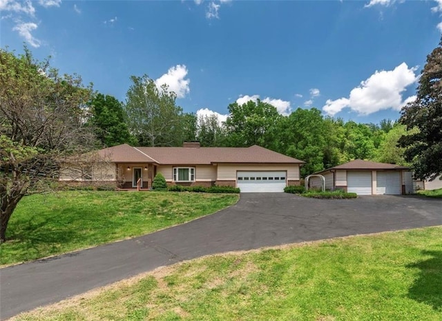 ranch-style home featuring a front lawn
