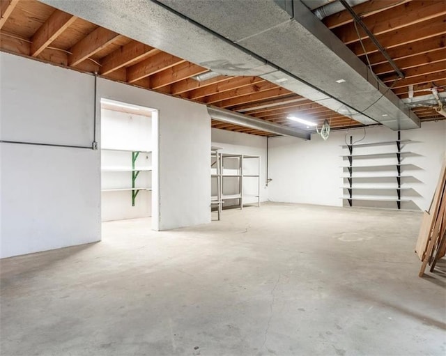 basement featuring stairs